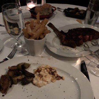 Steak 48 - Bone-In Ribeye, Crinkle Cut Fries, Roasted Brussels Sprouts, Corn Créme Bruleé - Steakhouses Near Me - Houston, Texas