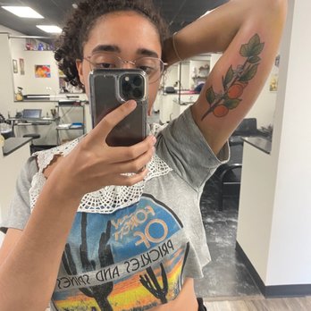 ANBU Art Collective - An orange branch just because I like oranges done by Kevin - Tattoo Near Me - Augusta, Georgia