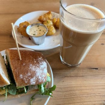 Three Hearts - Made in house Chai and chicken sausage and egg sandwich - Bakeries Near Me - Tacoma, Washington Three Hearts - Made in house Chai and chicken sausage and egg sandwich - Bakeries Near Me - Tacoma, Washington