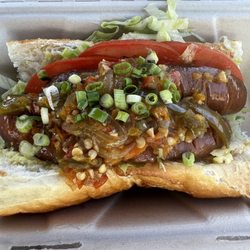Heart & Soul Again - Andouille Sausage Po-Boy- house cured and smoked served on crispy French bread with Cajun relish, lettuce and tomato