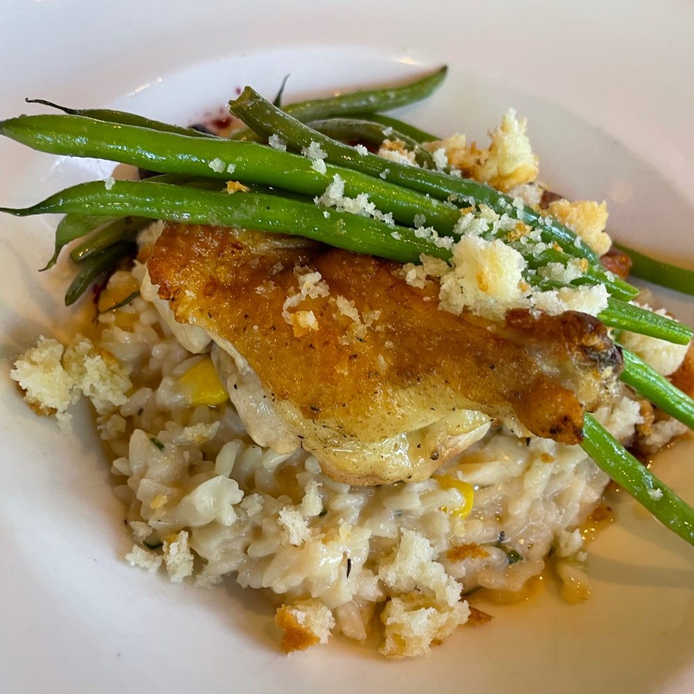 Wind & Waves Grill - Pan-roasted chicken with polenta, haricot vert, balsamic-blueberry chicken jus, and a biscuit crumble - Cocktail Bars Near Me - Vero Beach, Florida Wind & Waves Grill - Pan-roasted chicken with polenta, haricot vert, balsamic-blueberry chicken jus, and a biscuit crumble - Cocktail Bars Near Me - Vero Beach, Florida