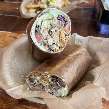 Spitz - Street cart wrap with chicken ($13.95). Garlic aioli, fried lavash chips, romaine, cabbage, tomato, onions, pepper, cucumber, and tzatziki. - Mediterranean Near Me - Minneapolis, Minnesota