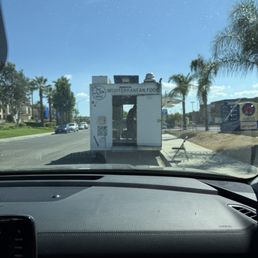 Hardworking cook in a hot truck
