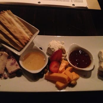 Unwind Wine Bar - Just a beautiful cheese plate and wine and I am in heaven! $10 bucks during happy hour. $12 regularly. - Wine Bars Near Me - Cincinnati, Ohio Unwind Wine Bar - Just a beautiful cheese plate and wine and I am in heaven! $10 bucks during happy hour. $12 regularly. - Wine Bars Near Me - Cincinnati, Ohio