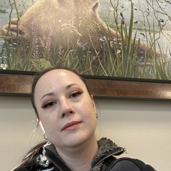 Alaska Oral Surgery Group - Waiting room has many seats, three big beautiful paintings, lots to read and nice view of outside