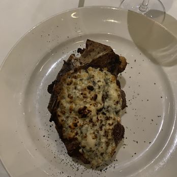 J-Prime Steakhouse - Blue cheese crusted bone in filet mignon - Steakhouses Near Me - San Antonio, Texas