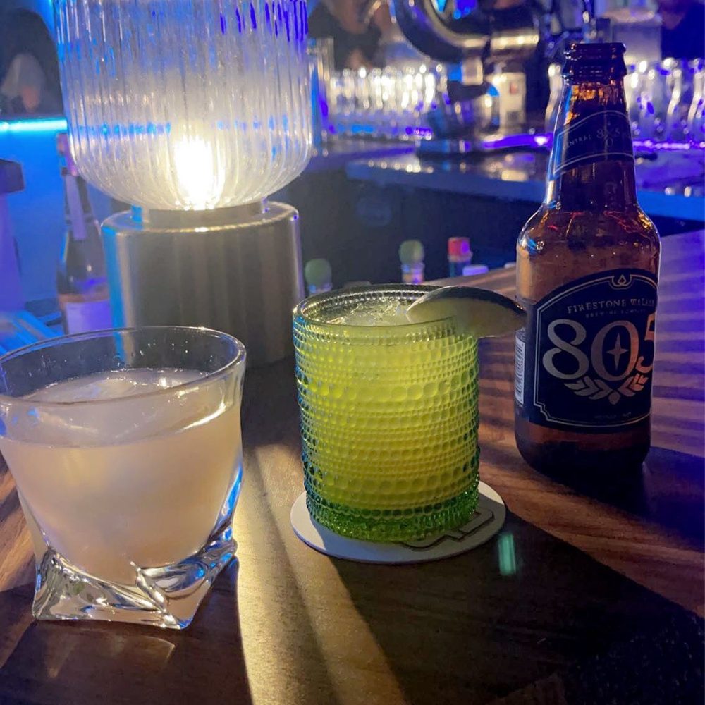 Middle 8 - Our drinks, from left to right. Mezcal, Tequila and sprite, beer. - Cocktail Bars Near Me - Pleasanton, California