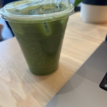 Wave 3 Coffee and Chocolate - Iced matcha latte with vanilla rose syrup - Coffee & Tea Near Me - Atlanta, Georgia