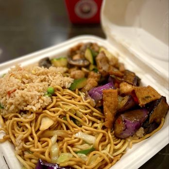 Panda Express - Bigger Plate with mushroom chicken, tofu & eggplant and extra chow mien (in the background) - Chinese Near Me - Brentwood, California