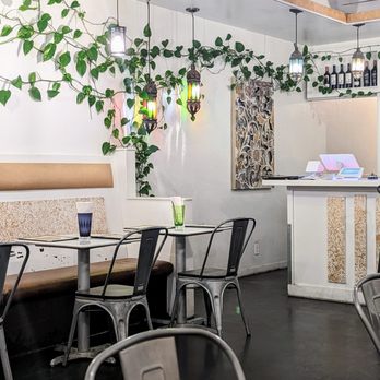 Spice Lounge - the interior of a restaurant with tables and chairs - Indian Near Me - San Diego, California