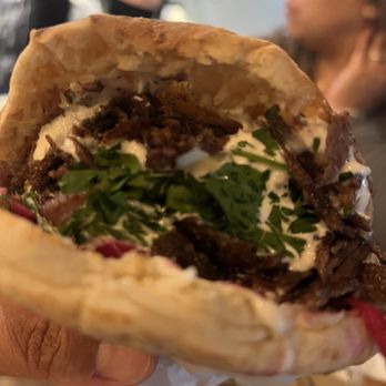 SimSim Shawarma House - Beef Shawarma (pita) in hand - Mediterranean Near Me - Anaheim, California SimSim Shawarma House - Beef Shawarma (pita) in hand - Mediterranean Near Me - Anaheim, California