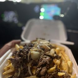 Golden Ox Brundage - Carne asada fries with grilled onions