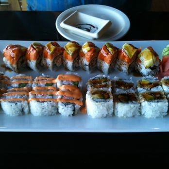 Tomo Sushi - Top roll is the Temptor, bottom left is crab asparagus and bottom right is the eel. - Japanese Near Me - Colorado Springs, Colorado
