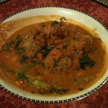 Lento Restaurant - African groundnut stew with quinoa-sweet potato 'meatballs' and bok choi - New American Near Me - Rochester, New York