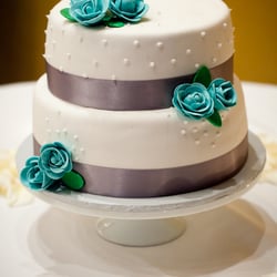 Cakes By Ginene - My adorable wedding cake by Ginene.  Fondant frosting, silver ribbon, blue sugar flowers.