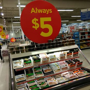 Real Canadian Superstore - a woman walking past a refrigerated deli - Grocery Near Me - Saskatoon, Saskatchewan Real Canadian Superstore - a woman walking past a refrigerated deli - Grocery Near Me - Saskatoon, Saskatchewan