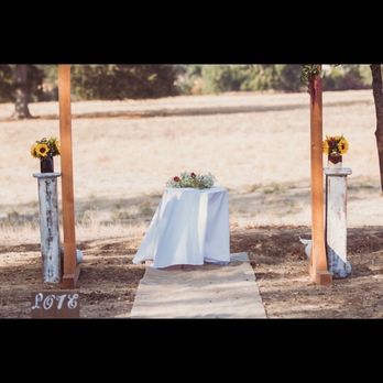 The Barn Door-Elegance & Rust Event Rentals - The white pillars were absolutely stunning out in the field. - Party Equipment Rentals Near Me - Redding, California