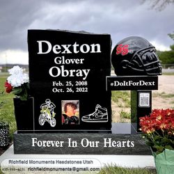 Black granite custom bench headstone with football helmet sculpture. Richfield Monuments Headstones Utah