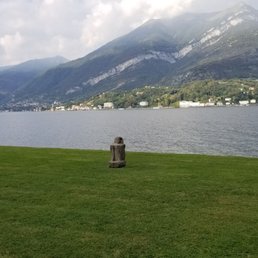 Statue framed by Lake Como Statue framed by Lake Como