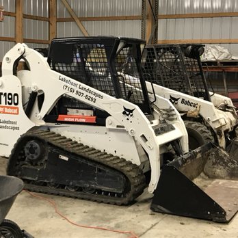 Lakefront Landscapes - a bobcat in a warehouse - Landscaping Near Me - Alden, New York Lakefront Landscapes - a bobcat in a warehouse - Landscaping Near Me - Alden, New York