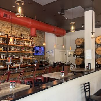 Charred Oak Kitchen and Bar - Beautiful bar as the back wall - New American Near Me - Columbus, Georgia Charred Oak Kitchen and Bar - Beautiful bar as the back wall - New American Near Me - Columbus, Georgia