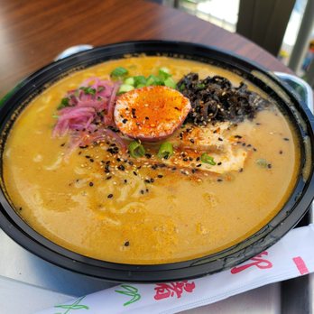 Mykuna - a bowl of soup on a table - Latin American Near Me - Houston, Texas Mykuna - a bowl of soup on a table - Latin American Near Me - Houston, Texas