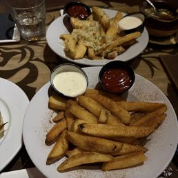 Grey Witch alcoholic beverage, filet mignon bites, french onion soup, garlic parm butter fries, Cajun fries.