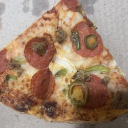 Onions, pepperoni, sausage, green peppers, and jalapeños.