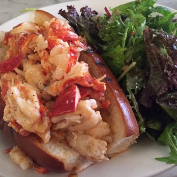 Neptune Oyster - Hot lobster roll.  Salad subbed for fries ! - Seafood Near Me - Boston, Massachusetts