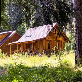 Minam River Lodge - Your own cabin with bed, wood fire stove, bathroom and front porch - Hiking Near Me - Enterprise, Oregon