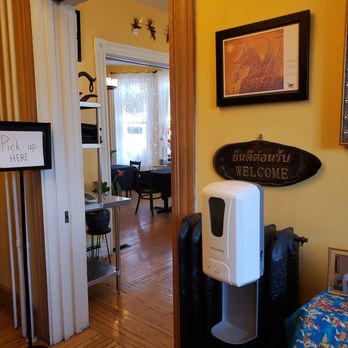 1001 Thai - a room with a surfboard on the wall - Thai Near Me - Easton, Pennsylvania