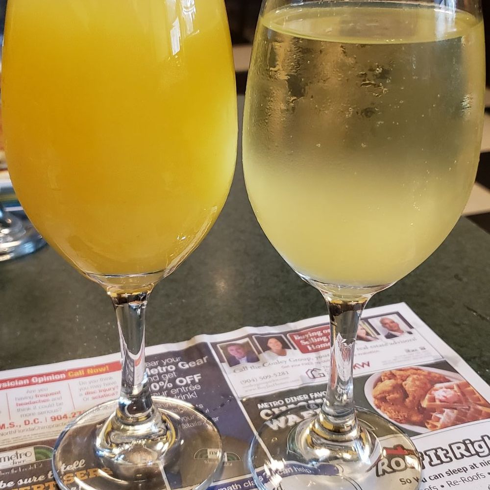 Metro Diner - My first mimosa on the left......my "extra special" one on the right - Breakfast & Brunch Near Me - Orange Park, Florida Metro Diner - My first mimosa on the left......my "extra special" one on the right - Breakfast & Brunch Near Me - Orange Park, Florida