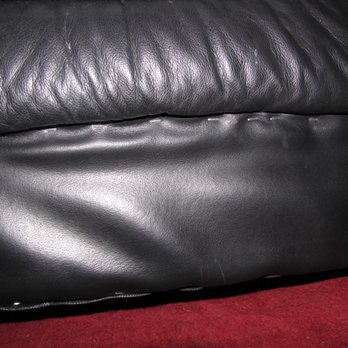 Joey's Movers - "Finished" work of the man they hired to fix our couch. Found it clearly stated on the man's website that he doesn't repair leather. - Movers Near Me - Skokie, Illinois