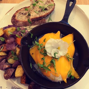 Ol Days - Poached eggs with Vegan cheddar, home fries, toast. - Breakfast & Brunch Near Me - New York, New York Ol Days - Poached eggs with Vegan cheddar, home fries, toast. - Breakfast & Brunch Near Me - New York, New York