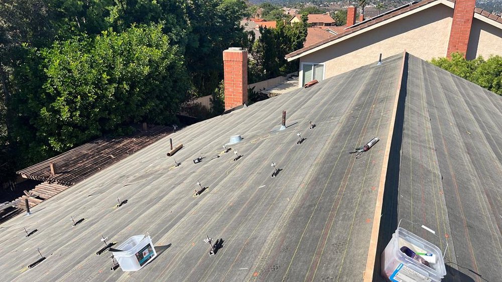 Slide of Morales Roofing