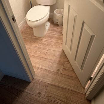 Hero Restoration - New flooring to replace flooded bathroom and old flooring that was damaged - Damage Restoration Near Me Hero Restoration - New flooring to replace flooded bathroom and old flooring that was damaged - Damage Restoration Near Me
