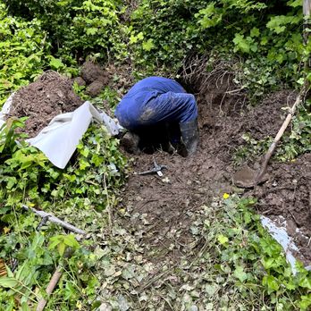 Barkley Plumbing - Plumber digging in the dirt, chasing that leak - Plumbing Near Me - Bellingham, Washington