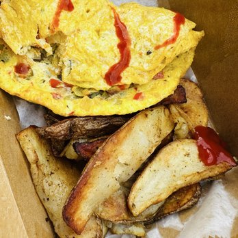 Sweet Sunday's Cafe - Omelette w/ Peppers & Potato Wedges + Added Hot Sauce after opening - Bakeries Near Me - Brooklyn, New York Sweet Sunday's Cafe - Omelette w/ Peppers & Potato Wedges + Added Hot Sauce after opening - Bakeries Near Me - Brooklyn, New York
