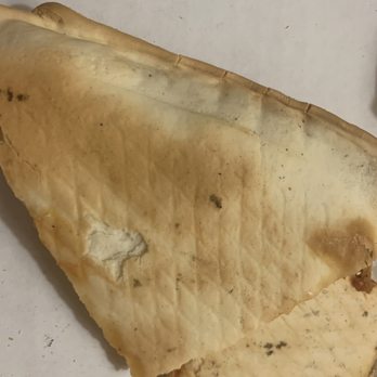 Sal's Pizza Pub - Picture of the dough undercooked and sticking to the pizza box - Pizza Near Me - Lombard, Illinois