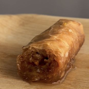 Ekosfere Bakery & Coffee Shop - a piece of pastry on a cutting board - Bakeries Near Me - Bronx, New York Ekosfere Bakery & Coffee Shop - a piece of pastry on a cutting board - Bakeries Near Me - Bronx, New York