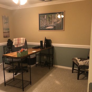Floor-Mart - a room with a desk, chair, and fan - Flooring Near Me - Cape Coral, Florida Floor-Mart - a room with a desk, chair, and fan - Flooring Near Me - Cape Coral, Florida