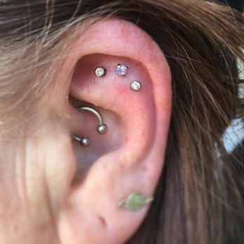Dimensions - Another gorgeous triple cartilage piercing... unique placement varies with anatomy. Paired prong set purple opal w/ clear cz's. - Piercing Near Me - Ocean City, Maryland Dimensions - Another gorgeous triple cartilage piercing... unique placement varies with anatomy. Paired prong set purple opal w/ clear cz's. - Piercing Near Me - Ocean City, Maryland