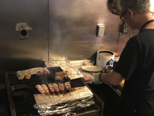 Photo of Halu - San Francisco, CA, US. Chef cooking Yakitori