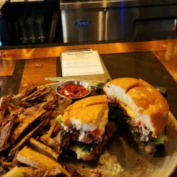 Oak & Iron - Burger of the day. Local meat grilled to perfection.
