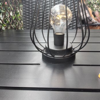 Budapest Restaurant - a table with a lamp on it - Caterers Near Me - London, Ontario