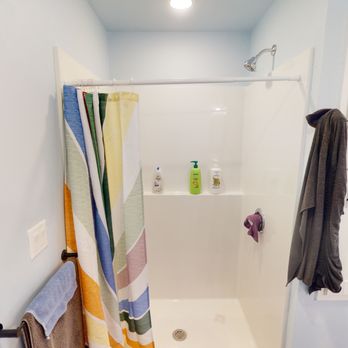 Linked Living Homes - a bathroom with a shower - General Contractors Near Me - Appleton, Wisconsin Linked Living Homes - a bathroom with a shower - General Contractors Near Me - Appleton, Wisconsin