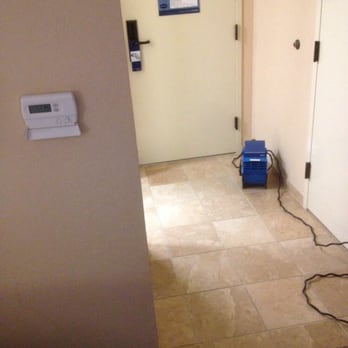 Hampton Inn Gainesville - AC unit for room. The regular AC was not working so they provided this solution - a noisy blower. - Hotels Near Me - Gainesville, Florida