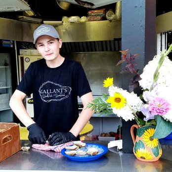 Brakish - Carson shucking my oysters! He's a gem... - Seafood Near Me - Charlottetown, Prince Edward Island