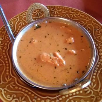 Jolly's Indian Bistro - The butter chicken, with 4 acceptable pieces of chicken and a few smaller bits. Never seen butter chicken with less chicken - Indian Near Me - Vancouver, British Columbia