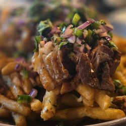 Common Theory - Sisig fries. Off the menu; you have to ask.